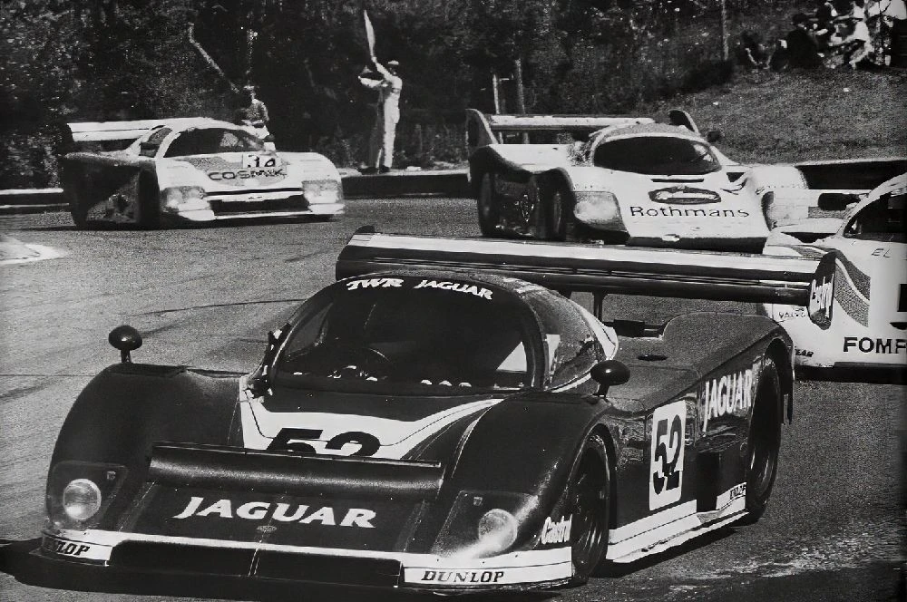 XJR-6 number 52 leading a pack of Group C cars