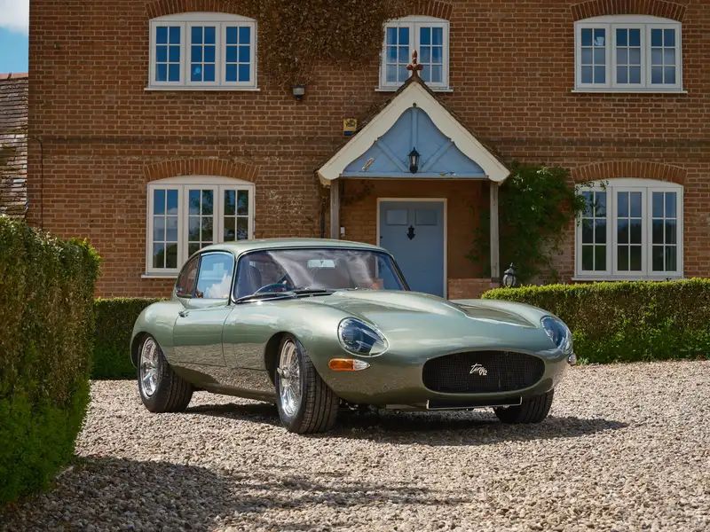 E-Type Re-Imagined — sage green coupe, front three-quarter view