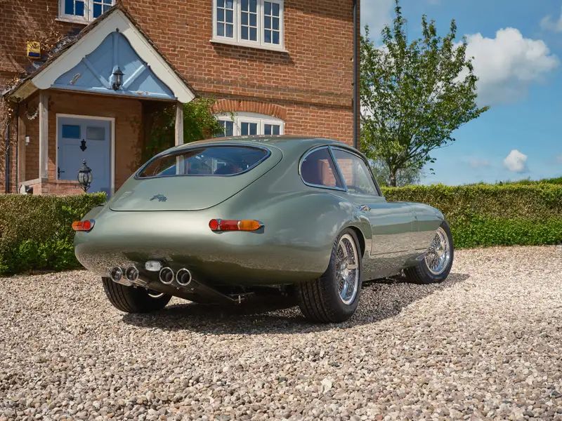 E-Type Re-Imagined — sage green coupe, rear three-quarter view
