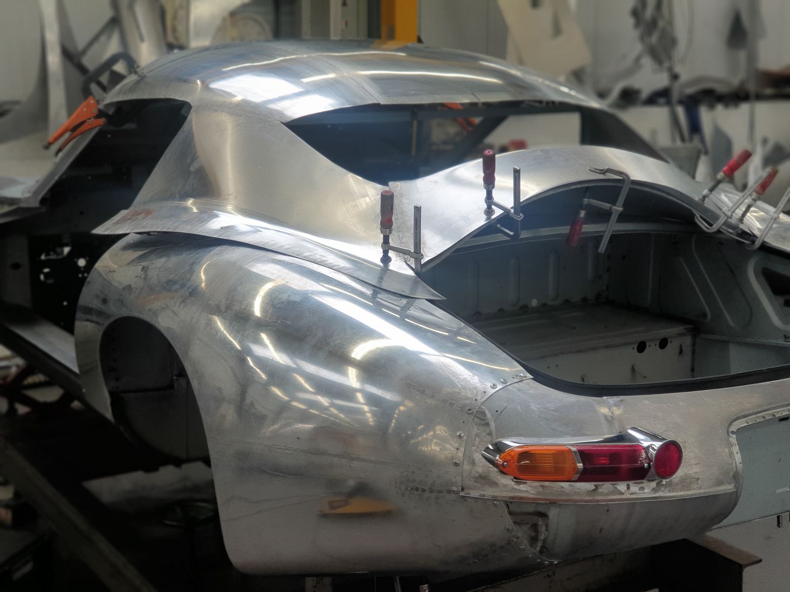 Build process — bare aluminium body shell taking shape