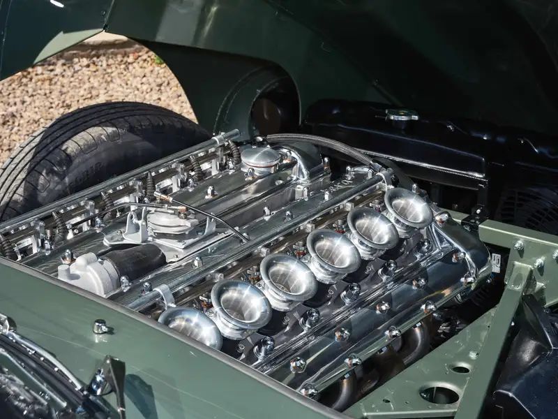 Donor straight-six engine bay with velocity stacks
