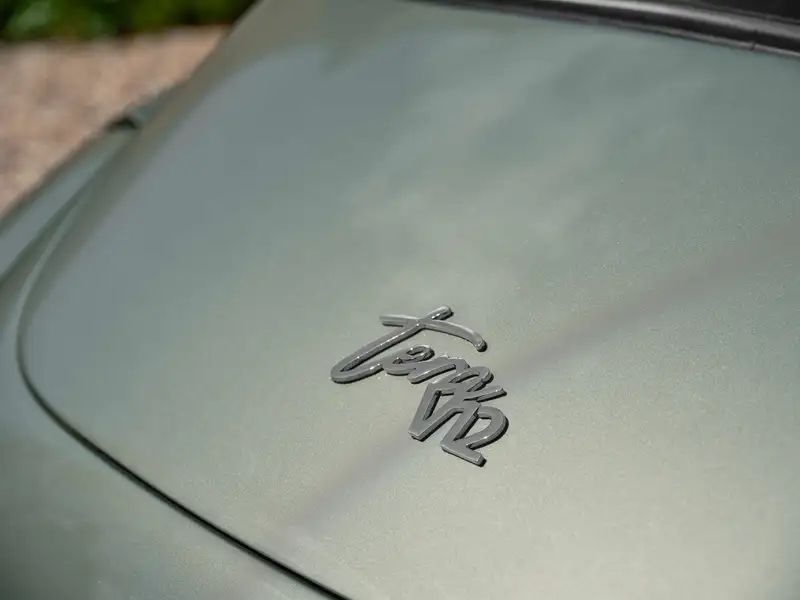 Bonnet with chrome script emblem