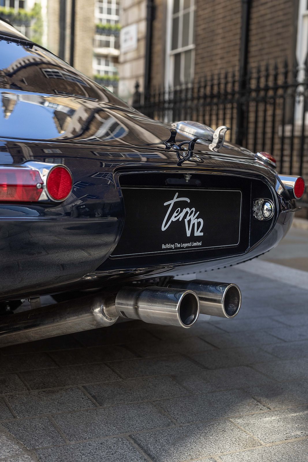 Black E-Type Re-Imagined — rear three-quarter with tera V12 plate