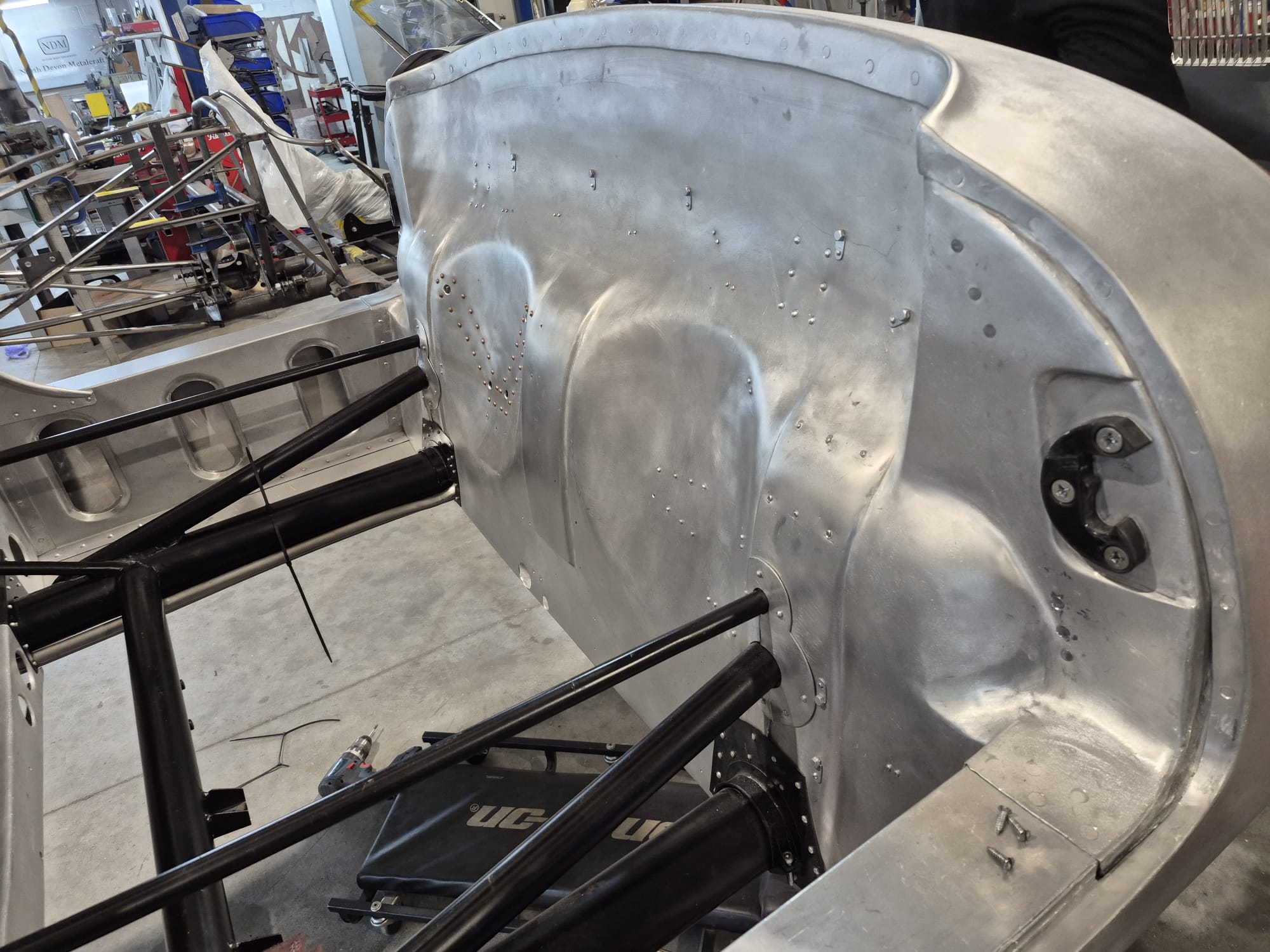 Skin fabrication with rivet and weld detail