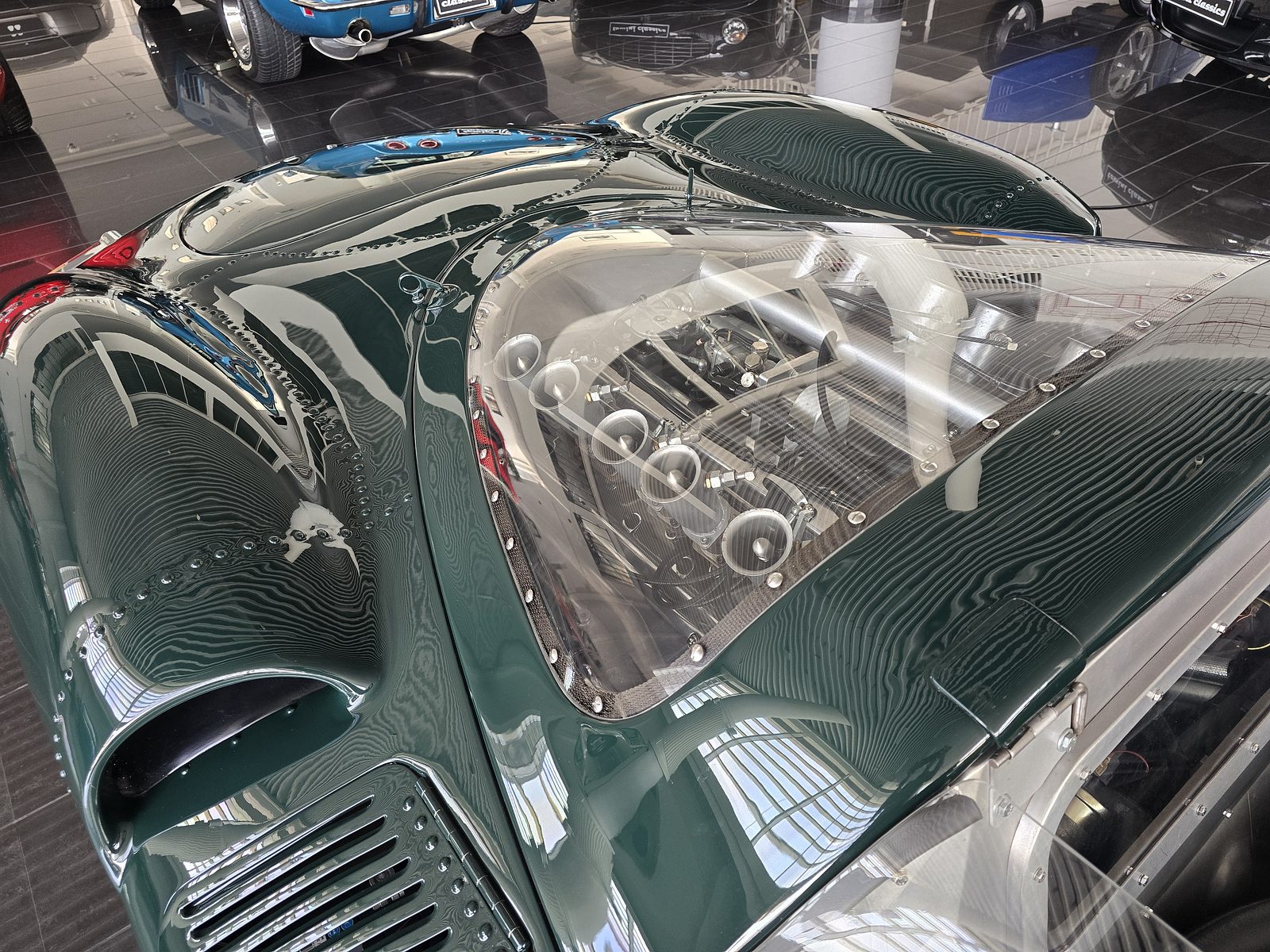 XJ13 Toolroom Copy — engine bay with velocity stacks
